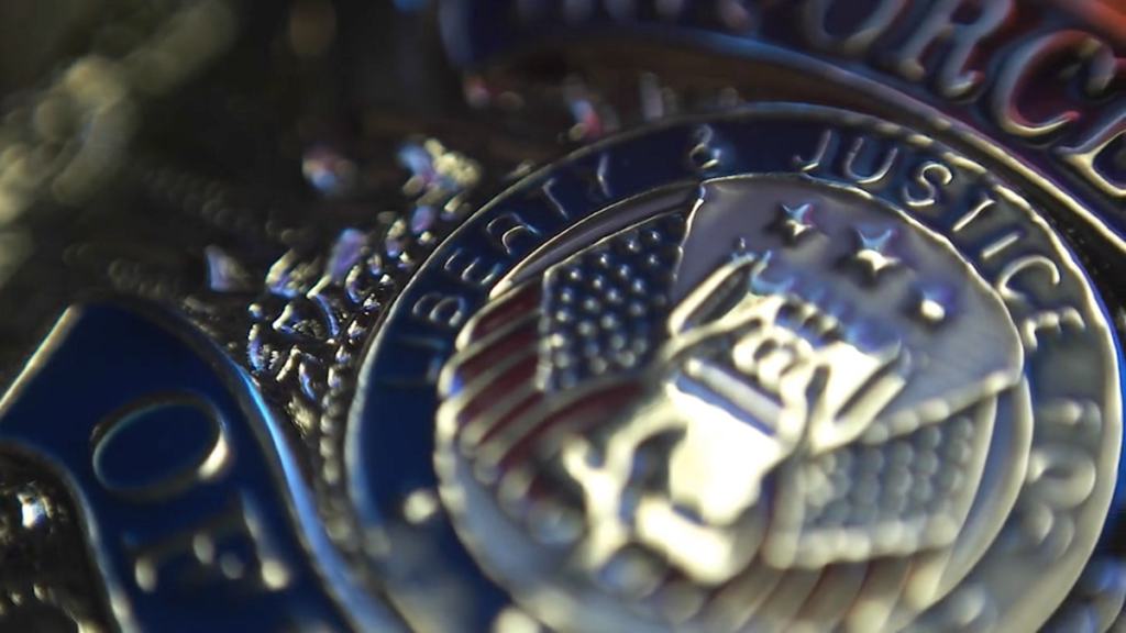 police-badge-screen-shot-from-video-crop-1024x576-1